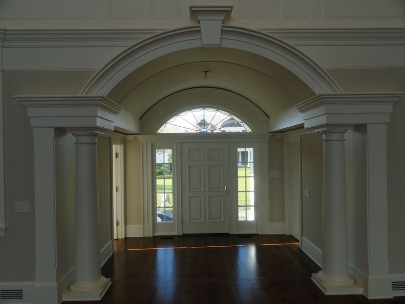 Front entry way with columns, interior view