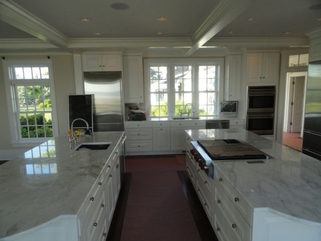 Newly remodeled kitchen with marble countertops