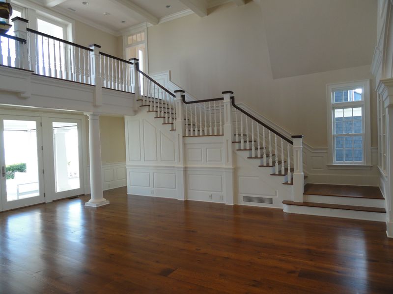Staircase and hardwood floors of remodeled home
