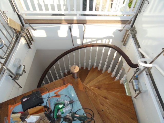 View looking from above of interior winding stair case