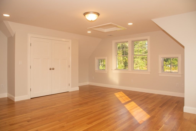 large room with wood floor
