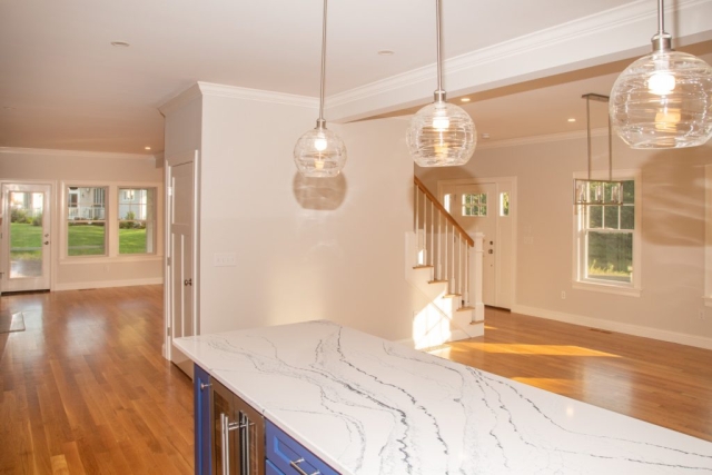 Kitchen island closeup with dropped ceiling lights